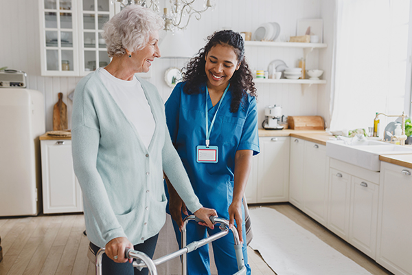 Nurse helping woman