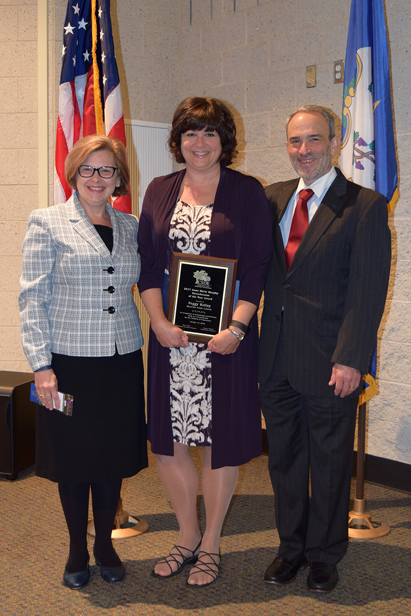 Paraeducator of the year 2017, Peggy Kelley with Commissioner Dianna Wentzell and Chairman of the Board Allan Taylor