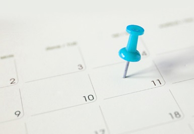 thumbtack on calendar