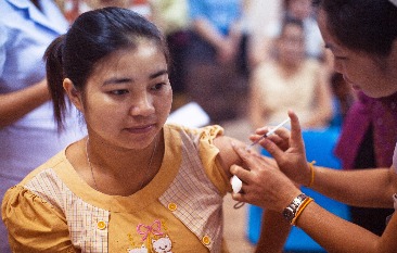 Woman getting vaccinated.