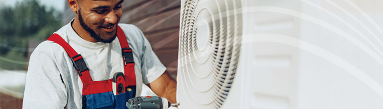 Weatherization Header, man repairing pump