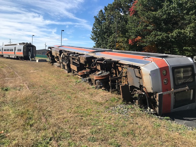 Turned over rail car