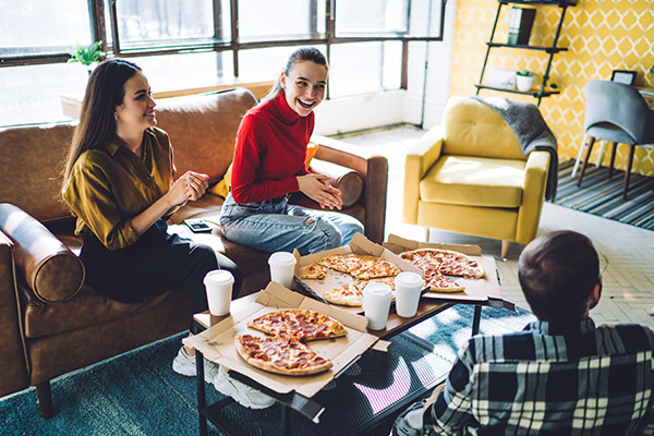People eating pizza