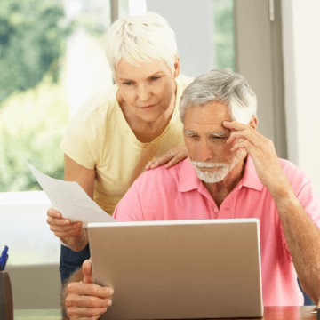 [photo of a woman reading on a computer, with a banner that says "EDUCATION"]