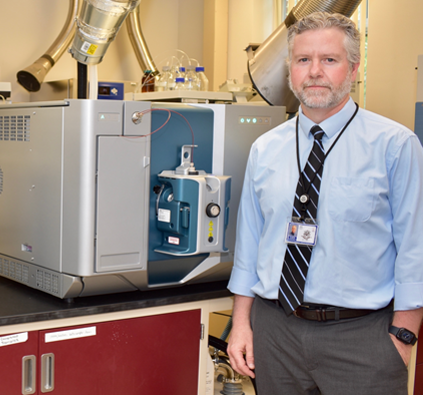 Director Dr. Jason C. White