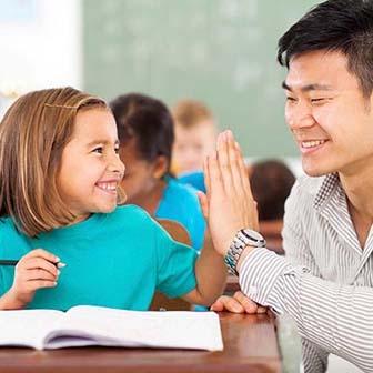 Student and teacher talking