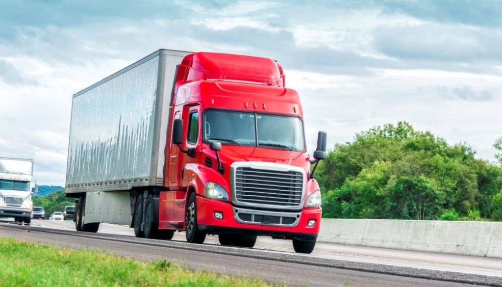 truck driving down the road