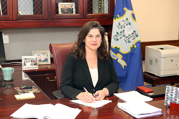 Commissioner Danté Bartolomeo inside an office.