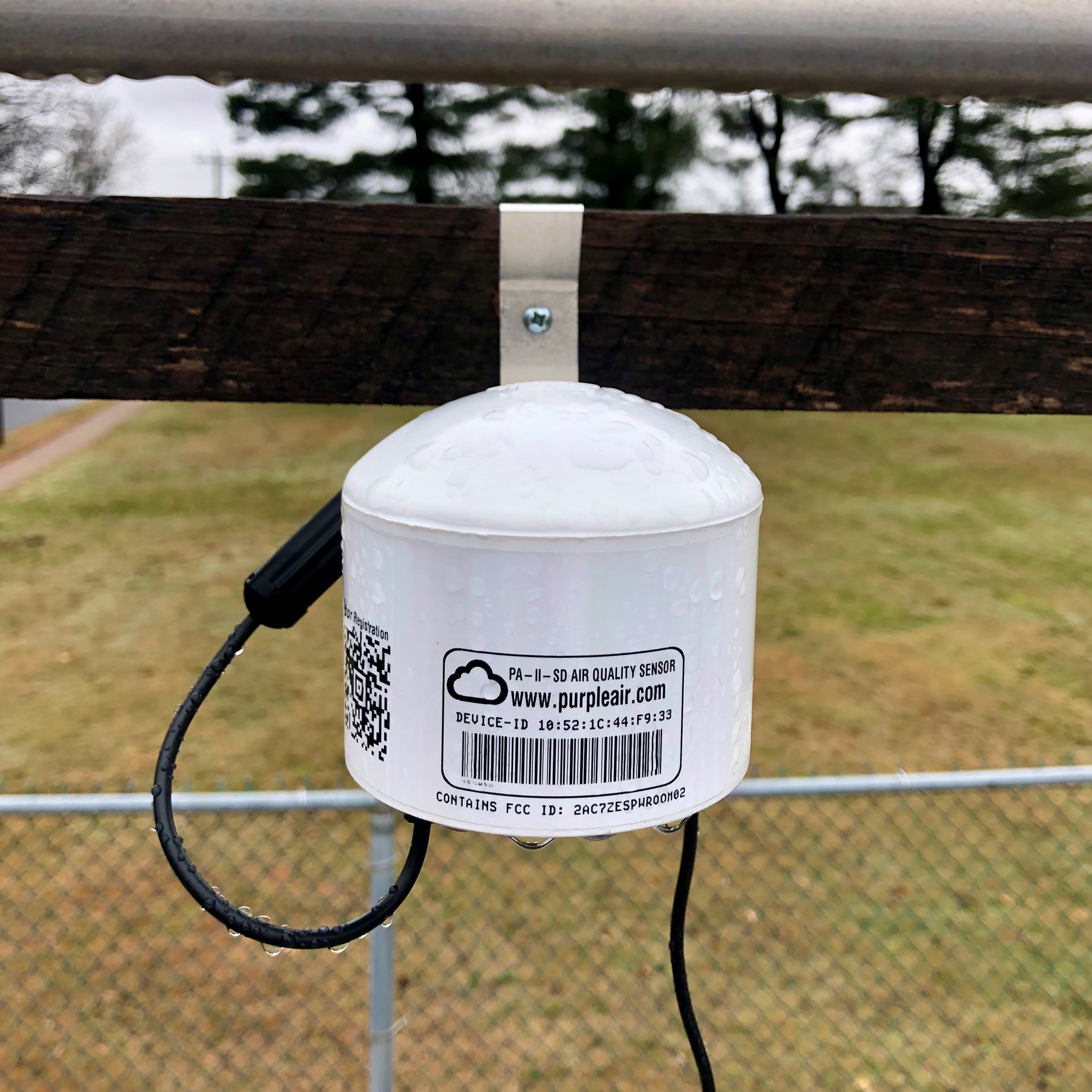 Photograph of a PurpleAir sensor deployed at an air monitoring station.