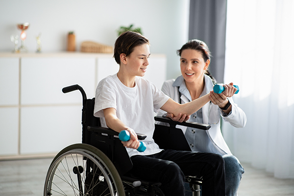 Teen getting physical therapy