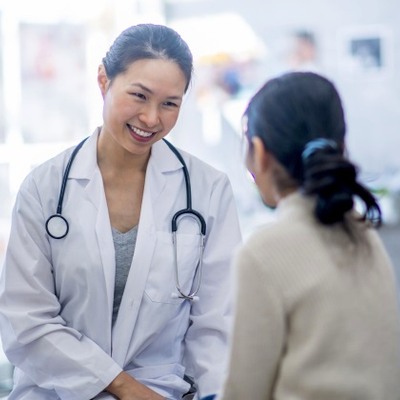 Doctor speaking with patient