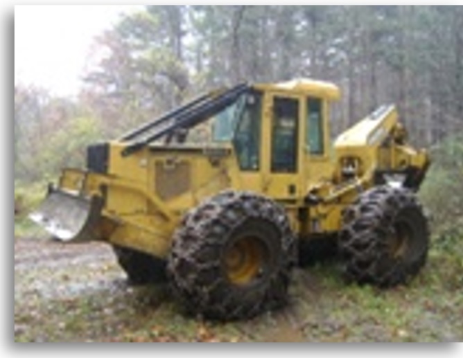 grapple skidder working in forest