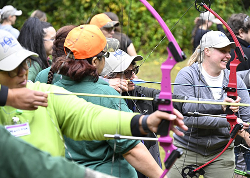 BOW Program participants test their archery skills.