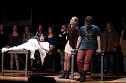 Students acting on stage