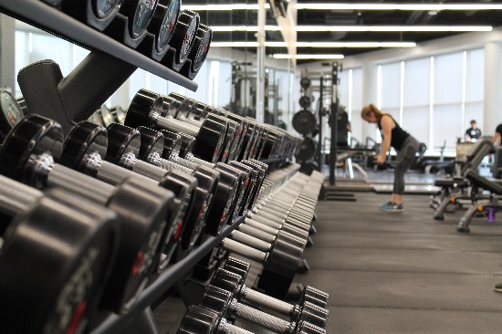 Gyms are open during the COVID pandemic, with social distancing and face coverings being required.
